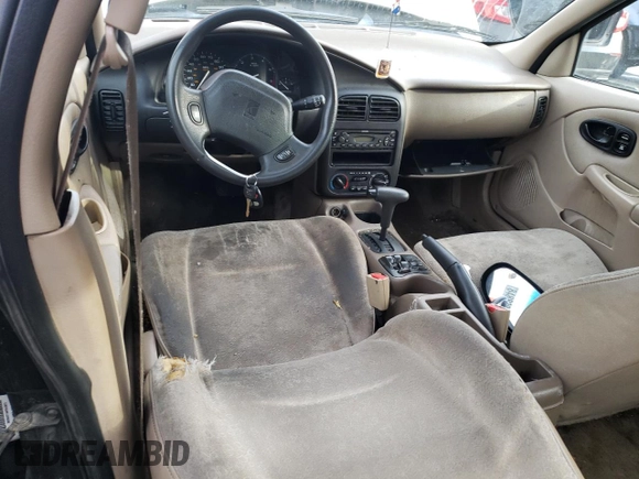 2001 Saturn SL z VIN 1G8ZH52851Z286886, wystawiony jako Copart lot #84883824 z przebiegiem Nie podano mil oraz Szkoda całkowita • Salvage title. Historia ofert i sprzedaży dostępna na DreamBid. Obrazek 8.