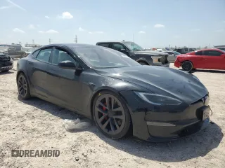 2023 Tesla Model S Plaid with VIN 5YJSA1E62PF511875, listed as a Copart auction lot 65583824 with Not provided miles and Salvage title. Bid and sale history available at DreamBid. Image 4.