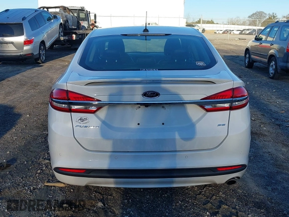 2018 Ford Fusion SE z VIN 3FA6P0H77JR108212, wystawiony jako IAAI lot #41208435 z przebiegiem 68 825 mil mil oraz . Historia ofert i sprzedaży dostępna na DreamBid. Obrazek 17.