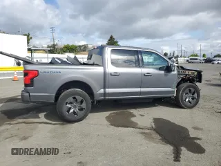 2023 Ford F-150 Lightning Pro with VIN 1FT6W1EV0PWG34788, listed as a Copart auction lot 54454805 with 11,432 mi miles and Salvage title. Bid and sale history available at DreamBid. Image 3.