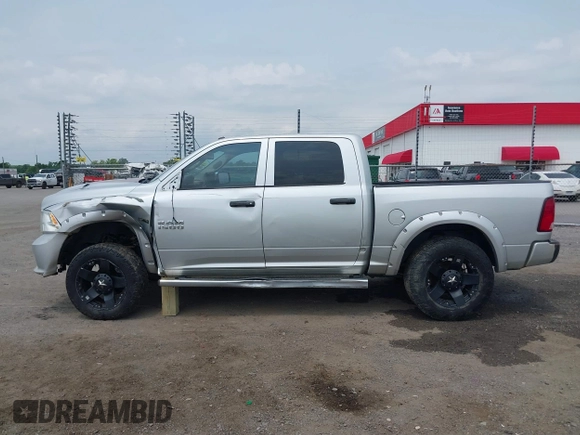 2014 Ram 1500 Express with VIN 3C6RR6KT9EG219721, listed as a IAAI auction lot 42385648 with 168,233 mi miles and . Bid and sale history available at DreamBid. Image 14.