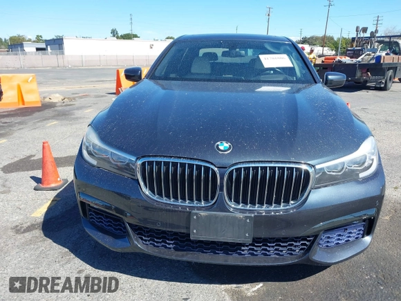 2016 BMW 7 Series 740i with VIN WBA7E2C52GG548048, listed as a IAAI auction lot 41701806 with 72,680 mi miles. Bid and sale history available at carsss.com. Image 12.