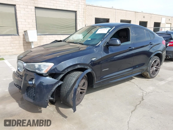 2015 BMW X4 xDrive35i with VIN 5UXXW5C50F0E87728, listed as a IAAI auction lot 41819628 with 136,042 mi miles and . Bid and sale history available at DreamBid. Image 2.