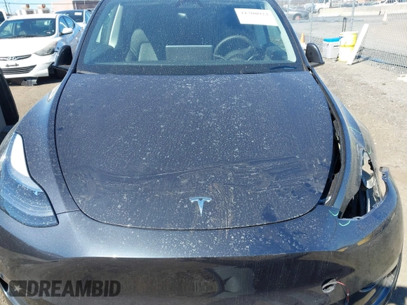 2024 Tesla Model Y Long Range with VIN 7SAYGDEE4RF149457, listed as a IAAI auction lot 41700922 with Not Provided miles. Bid and sale history available at carsss.com. Image 10.