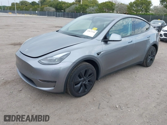 2025 Tesla Model Y Long Range with VIN 7SAYGDED5SF257258, listed as a IAAI auction lot 41877196 with 4,442 mi miles and . Bid and sale history available at DreamBid. Image 2.