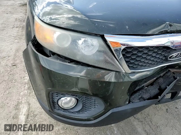 2012 Kia Sorento EX z VIN 5XYKU4A29CG247228, wystawiony jako Copart lot #55521865 z przebiegiem 149 036 mil mil oraz Szkoda całkowita • Salvage title. Historia ofert i sprzedaży dostępna na DreamBid. Obrazek 14.