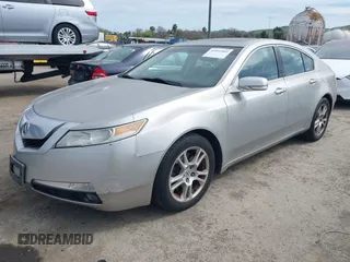 2009 Acura TL Tech with VIN 19UUA86529A012577, listed as a IAAI auction lot 41852402 with 152,416 mi miles. Bid and sale history available at carsss.com. Image 2.