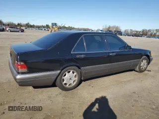 1995 Mercedes-Benz S with VIN WDBGA51E7SA246509, listed as a Copart auction lot 79333654 with 143,257 mi miles and Clean Title. Bid and sale history available at DreamBid. Image 3.