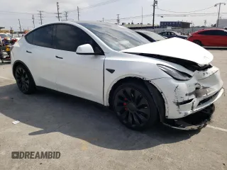 2022 Tesla Model Y Performance with VIN 7SAYGDEF6NF493231, listed as a Copart auction lot 52336284 with 37,116 mi miles and Salvage title. Bid and sale history available at DreamBid. Image 4.