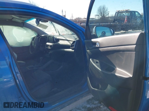 2019 Hyundai Tucson Sport with VIN KM8J33ALXKU857925, listed as a IAAI auction lot 41369786 with 41,365 mi miles. Bid and sale history available at carsss.com. Image 5.
