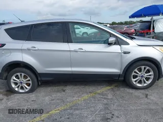 2017 Ford Escape SE with VIN 1FMCU0G90HUC81240, listed as a IAAI auction lot 40607814 with 68,333 mi miles and . Bid and sale history available at DreamBid. Image 13.
