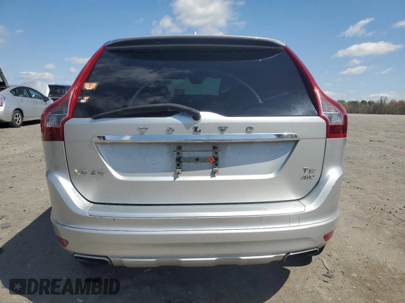 2014 Volvo XC60 R-Design Premier Plus z VIN YV4902DZ1E2543491, wystawiony jako Copart lot #51699955 z przebiegiem 114 688 mil mil oraz Szkoda całkowita • Salvage title. Historia ofert i sprzedaży dostępna na DreamBid. Obrazek 6.