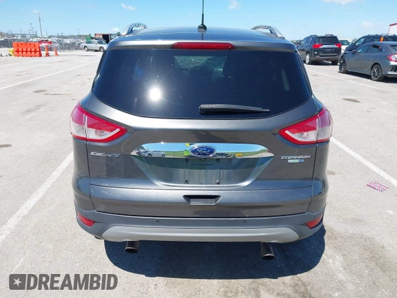 2015 Ford Escape Titanium z VIN 1FMCU9J92FUB01007, wystawiony jako IAAI lot #42319246 z przebiegiem 90 782 mil mil oraz . Historia ofert i sprzedaży dostępna na DreamBid. Obrazek 17.