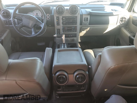 2003 Hummer H2 with VIN 5GRGN23UX3H136571, listed as a Copart auction lot 80823054 with 220,003 mi miles and Salvage Title. Bid and sale history available at carsss.com. Image 8.