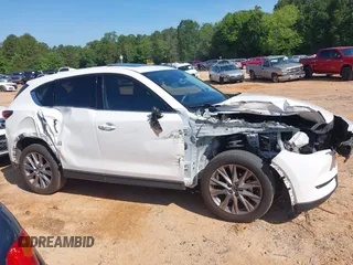 2021 Mazda CX-5 Grand Touring with VIN JM3KFBDM3M0493752, listed as a IAAI auction lot 42456854 with 35,122 mi miles and . Bid and sale history available at DreamBid. Image 13.