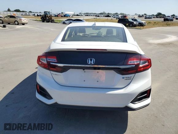 2021 Honda Clarity Touring z VIN JHMZC5F31MC001450, wystawiony jako Copart lot #55532565 z przebiegiem 14 873 mil mil oraz Szkoda całkowita • Salvage title. Historia ofert i sprzedaży dostępna na DreamBid. Obrazek 6.
