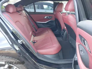 2023 BMW 3 Series 330i with VIN 3MW69FF03P8D45563, listed as a IAAI auction lot 41932536 with 19,496 mi miles and . Bid and sale history available at DreamBid. Image 8.