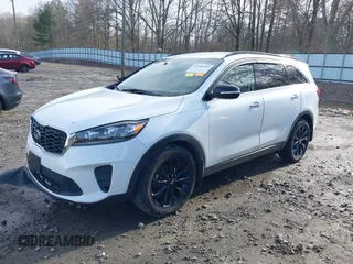 2019 Kia Sorento LX with VIN 5XYPG4A54KG599963, listed as a IAAI auction lot 41558055 with 119,238 mi miles and . Bid and sale history available at DreamBid. Image 2.