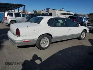 1994 Chrysler LHS z VIN 2C3ED56F9RH225470, wystawiony jako Copart lot #83089504 z przebiegiem 154 488 mil mil oraz Tytuł czysty. Historia ofert i sprzedaży dostępna na DreamBid. Obrazek 3.