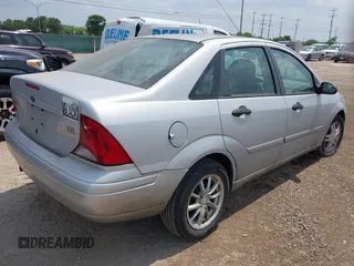 2004 Ford Focus ZTS with VIN 1FAFP38Z54W124641, listed as a IAAI auction lot 42163060 with 162,330 mi miles and . Bid and sale history available at carsss.com. Image 4.