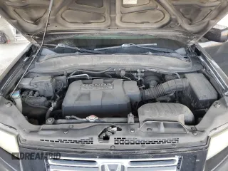 2007 Honda Ridgeline RTL z VIN 2HJYK16517H545034, wystawiony jako Copart lot #59819385 z przebiegiem 258 928 mil mil oraz Czysty tytuł • Clean title. Historia ofert i sprzedaży dostępna na DreamBid. Obrazek 11.