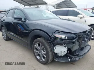 2024 Mazda CX-30 2.5 S Preferred Package with VIN 3MVDMBCMXRM669336, listed as a IAAI auction lot 41895722 with 23,554 mi miles. Bid and sale history available at carsss.com. Image 1.