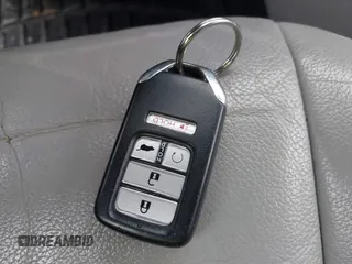 2018 Honda Pilot EX-L with VIN 5FNYF5H50JB022680, listed as a IAAI auction lot 41919787 with 159,205 mi miles and . Bid and sale history available at DreamBid. Image 11.