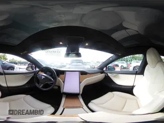 2020 Tesla Model S Long Range with VIN 5YJSA1E25LF396213, listed as a IAAI auction lot 42383231 with 73,125 mi miles and . Bid and sale history available at DreamBid. Image 22.