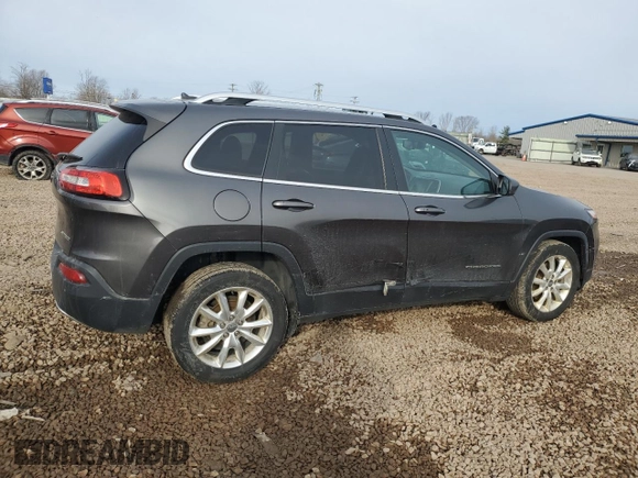 2015 Jeep Cherokee Limited with VIN 1C4PJLDB7FW701648, listed as a Copart auction lot 49612655 with 118,760 mi miles and Salvage Title. Bid and sale history available at DreamBid. Image 3.