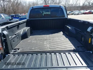 2013 Toyota Tacoma with VIN 3TMMU4FN8DM054973, listed as a IAAI auction lot 41659232 with 113,734 mi miles. Bid and sale history available at carsss.com. Image 12.