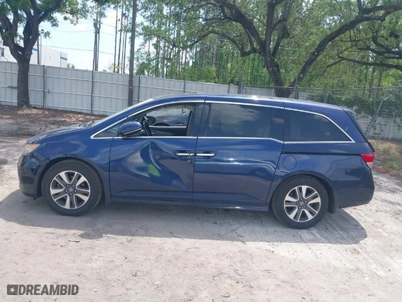 2015 Honda Odyssey Touring Elite with VIN 5FNRL5H96FB039538, listed as a IAAI auction lot 41877882 with 136,007 mi miles. Bid and sale history available at carsss.com. Image 14.