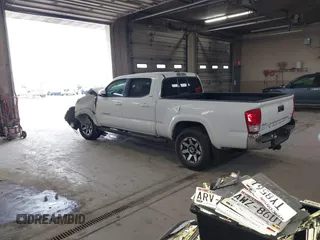 2016 Toyota Tacoma SR5 with VIN 3TMDZ5BN2GM007990, listed as a IAAI auction lot 41288736 with 76,179 mi miles. Bid and sale history available at carsss.com. Image 3.
