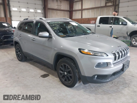 2016 Jeep Cherokee Latitude z VIN 1C4PJMCB9GW148882, wystawiony jako IAAI lot #42210237 z przebiegiem 124 441 mil mil oraz . Historia ofert i sprzedaży dostępna na DreamBid. Obrazek 1.