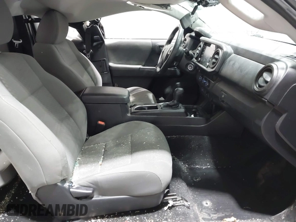2021 Toyota Tacoma SR with VIN 3TYRX5GN8MT011370, listed as a IAAI auction lot 41287330 with 73,447 mi miles and . Bid and sale history available at DreamBid. Image 5.