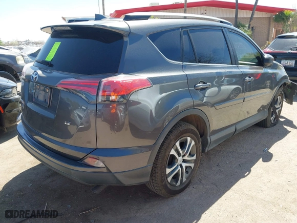 2018 Toyota RAV4 LE with VIN JTMZFREV2JJ190085, listed as a IAAI auction lot 41895635 with 54,577 mi miles. Bid and sale history available at carsss.com. Image 4.