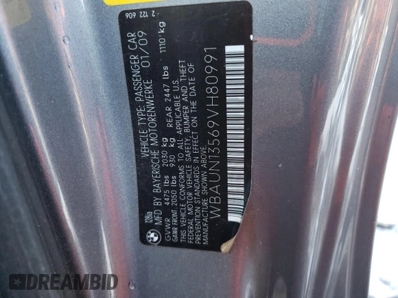 2009 BMW 1 Series 128i with VIN WBAUN13569VH80991, listed as a Copart auction lot 43225685 with 104,652 mi miles and Salvage Title. Bid and sale history available at DreamBid. Image 12.