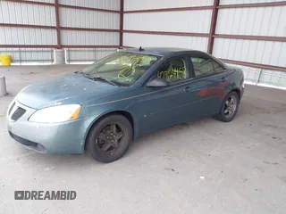 2009 Pontiac G6 1SA with VIN 1G2ZG57B694157985, listed as a IAAI auction lot 42374458 with 202,323 mi miles and . Bid and sale history available at DreamBid. Image 2.