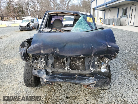 1999 Ford Ranger XL with VIN 1FTYR10C0XTA88744, listed as a Copart auction lot 44258415 with 202,709 mi miles and Salvage title. Bid and sale history available at DreamBid. Image 5.