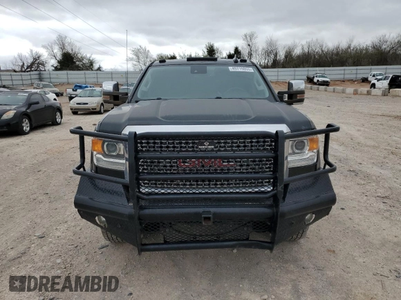 2015 GMC Sierra 3500HD Denali z VIN 1GT424E80FF506967, wystawiony jako Copart lot #49715055 z przebiegiem 191 033 mil mil oraz Czysty tytuł • Clean title. Historia ofert i sprzedaży dostępna na DreamBid. Obrazek 5.