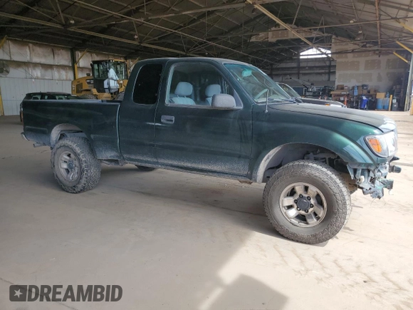 1999 Toyota Tacoma PreRunner with VIN 4TASN92N2XZ497397, listed as a Copart auction lot 56367005 with 281,137 mi miles and Salvage title. Bid and sale history available at DreamBid. Image 4.