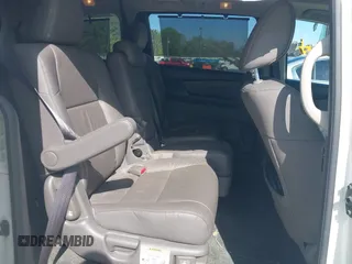 2013 Honda Odyssey Touring with VIN 5FNRL5H96DB009694, listed as a IAAI auction lot 42002487 with 182,867 mi miles and . Bid and sale history available at carsss.com. Image 8.