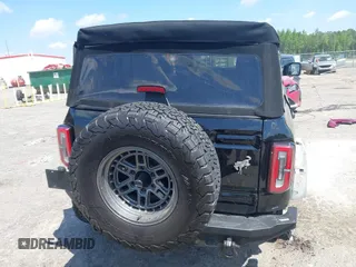 2021 Ford Bronco с VIN 1FMDE5BH2MLB03794, выставлен на аукционе IAAI как лот 42180534 с пробегом 59 807 миль миль и . История ставок и продаж доступна на DreamBid. Изображение 17.