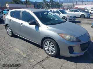 2012 Mazda Mazda3 i Touring with VIN JM1BL1L87C1609141, listed as a IAAI auction lot 41871418 with 125,253 mi miles. Bid and sale history available at carsss.com. Image 1.