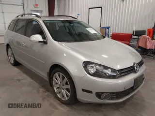 2012 Volkswagen Jetta SportWagen TDI with VIN 3VWML7AJ4CM668312, listed as a IAAI auction lot 41998809 with 130,866 mi miles. Bid and sale history available at carsss.com. Image 1.