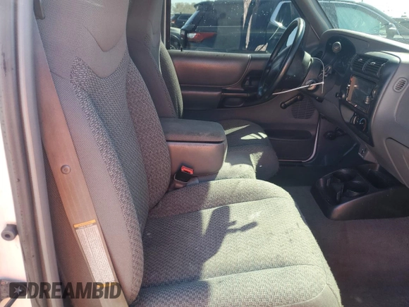 1999 Ford Ranger XL with VIN 1FTYR10C2XUB79251, listed as a Copart auction lot 49292095 with 73,127 mi miles and Salvage Title. Bid and sale history available at DreamBid. Image 10.