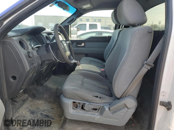 2014 Ford F-150 XL with VIN 1FTMF1CM2EKD70205, listed as a Copart auction lot 43963335 with 214,912 mi miles and Salvage title. Bid and sale history available at DreamBid. Image 7.
