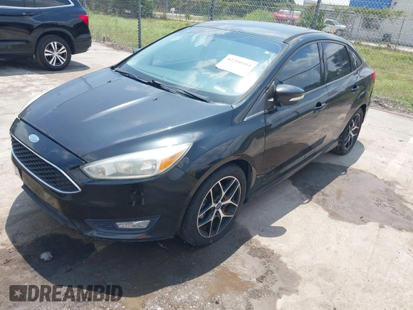 2015 Ford Focus SE with VIN 1FADP3F21FL280550, listed as a IAAI auction lot 42200104 with 146,175 mi miles and . Bid and sale history available at DreamBid. Image 2.