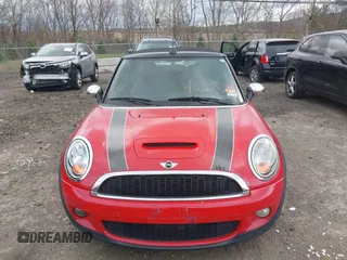 2010 MINI Convertible S with VIN WMWMS3C58ATY09229, listed as a IAAI auction lot 42055305 with 142,396 mi miles and . Bid and sale history available at DreamBid. Image 6.