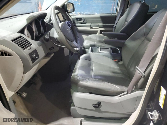 2009 Dodge Grand Caravan SXT with VIN 2D8HN54XX9R519859, listed as a Copart auction lot 52333295 with 123,147 mi miles and Clean Title. Bid and sale history available at carsss.com. Image 7.