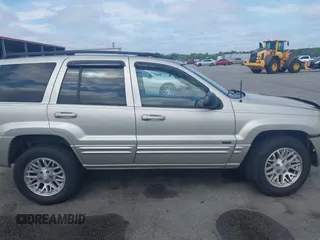 2004 Jeep Grand Cherokee Limited with VIN 1J4GX58SX4C255363, listed as a IAAI auction lot 42619798 with 239,475 mi miles and . Bid and sale history available at DreamBid. Image 13.